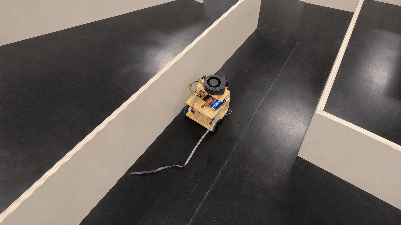 Photo of the autonomous firefighter robot navigating a maze course